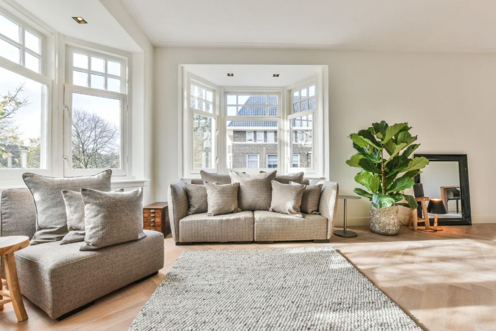 Light-filled living room with bay windows